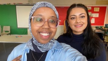 Researchers Hiba Adan and Nimmy Sidhu smiling into the camera