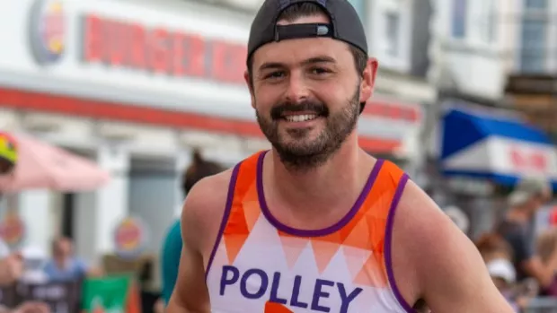 Man runs marathon in MS Society branded top